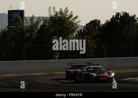 Barcelona, Spain. 30 September 2018. Blancpain GT Endurance Series; 58 LEGODAR Come Garage 59 McLaren 650 S GT3, seen during the race at sunset. Credit: Eric Alonso/SOPA Images/ZUMA Wire/Alamy Live News Stock Photo