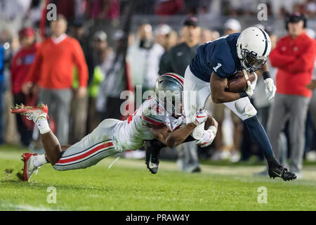 University Park, Pennsylvania, USA. 29th Sep, 2018. Penn State Nittany Lions wide receiver KJ Hamler (1) is tackled by Ohio State Buckeyes safety Isaiah Pryor (12) during the second half of the NCAA football game between the Ohio State Buckeyes and the Penn State Nittany Lions at Beaver Stadium in University Park, Pennsylvania. Credit: csm/Alamy Live News Stock Photo