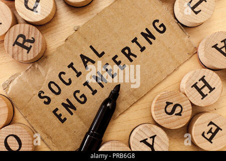 Handwriting text writing Social Engineering. Concept meaning Psychological Manipulation Gain Access thru Fraud. Stock Photo