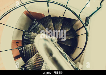 Spiral staircase top view, toned background image with place for text Stock Photo