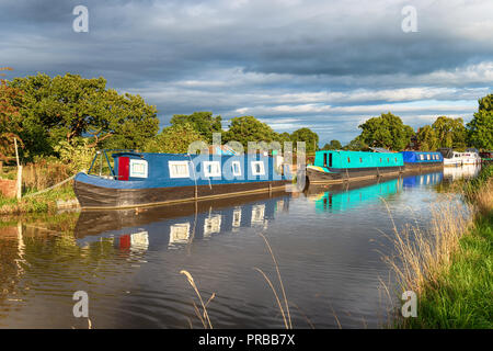 Canal boats on the Shropshire Union Canal as it passes through Waverton in Cheshire Stock Photo