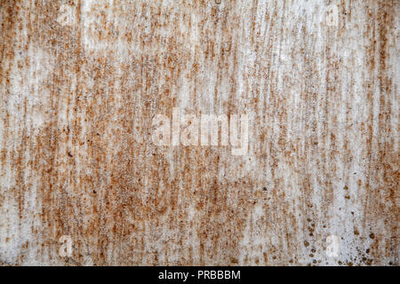 surface of rusty iron with remnants of old paint, chipped paint, texture background. Stock Photo