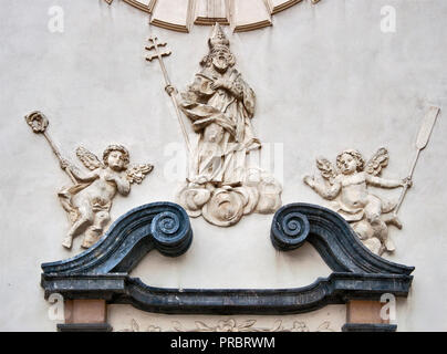 Baroque portal at Romanesque Church of St Adalbert aka Church of St Wojciech at Main Market Square in Krakow, Poland Stock Photo