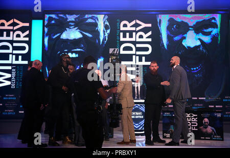 Deontay Wilder (left) and Tyson Fury (right) during a press conference at BT Sport Studio, London. PRESS ASSOCIATION Photo. Picture date: Monday October 1, 2018. See PA story BOXING Fury. Photo credit should read: Steven Paston/PA Wire. Stock Photo