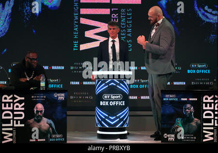 Deontay Wilder (left) and Tyson Fury (right) during a press conference at BT sport Studio, London. PRESS ASSOCIATION Photo. Picture date: Monday October 1, 2018. See PA story BOXING Fury. Photo credit should read: Steven Paston/PA Wire. Stock Photo
