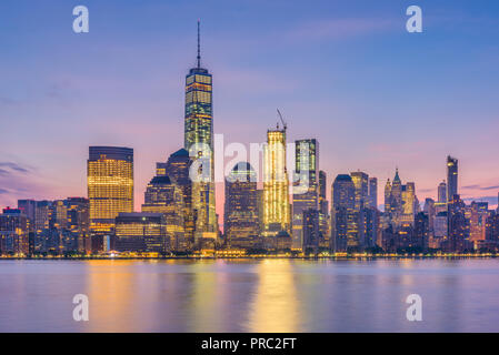 Lower Manhattan skyline at dawn across the Hudson River, New York City ...