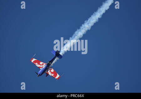 An Extra 330 plane from the french air force making a performance at the Francazal air show near Toulouse. Stock Photo