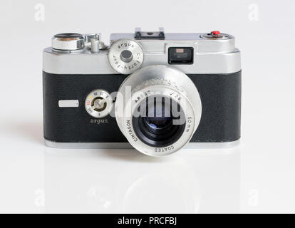An American made Argus C44R 35mm rangefinder film camera with a Cintagon f-2.8 50mm lens - The C44R cameras were manufactured during the years of 1958 Stock Photo
