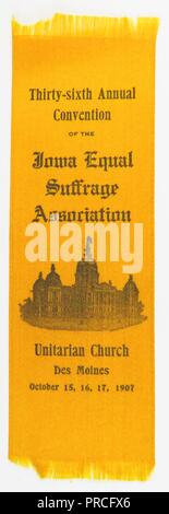 Yellow suffrage ribbon or badge, issued by the Iowa Equal Suffrage Association, for their 'Thirty-sixth Annual Convention, ' which was held in the Unitarian Church of Des Moines, Iowa, manufactured for the American market, October, 1907. Photography by Emilia van Beugen. () Stock Photo