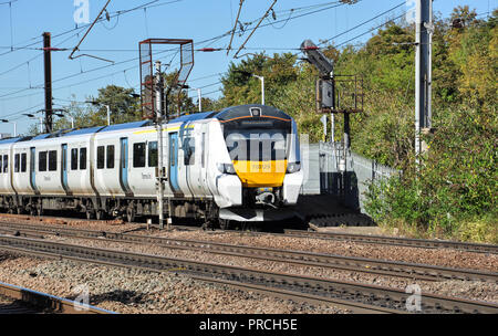 Thameslink class 700 electric multiple units head south from the station at Hitchin, Hertfordshire, England, UK Stock Photo