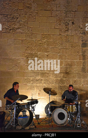 Italy, Mola di Bari, September 13th 2018, Angioino castle. Performer in action in a public concert Stock Photo