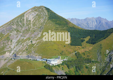 AERIAL VIEW. Le Gargas Summit (2208m asl) overlooking the Sanctuary of Notre-Dame de la Salette (1769m asl). La Salette-Fallavaux, Isère, France. Stock Photo