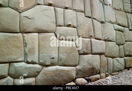 Incredible Inca Wall on Hatun Rumiyoc Street, Famous Ancient Street in Cusco, Peru, South America, Archaeological site Stock Photo