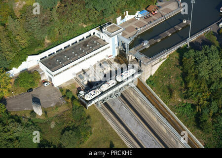 AERIAL VIEW. 3 pleasure boats being raised 44 meters on the inclined plane of Saint-Louis-Arzviller on the Marne River to Rhine River Canal. France.