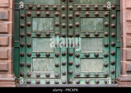 Stunning green colored door of Cusco Cathedral in Cusco, Peru, South America Stock Photo