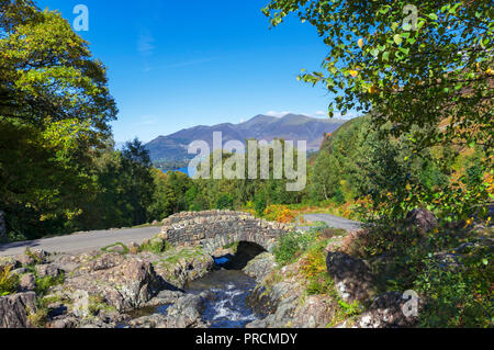 Ashness Bridge with Skiddaw massif in the distance, Borrowdale, Lake District, Cumbria, UK
