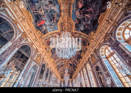 Hall of Mirrors ceiling in Versailles palace near Paris, France