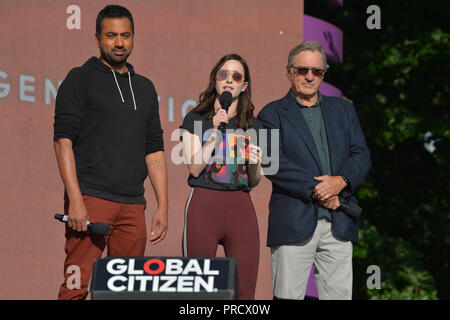 Kal Penn, Rachel Brosnahan and Robert De Niro onstage during the 2018 Global Citizen Concert at Central Park, Great Lawn on September 29, 2018 in New  Stock Photo