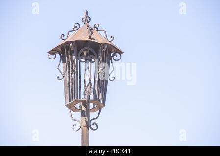 old retro street lamp on the sky background Stock Photo