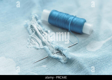 the composition of the seamstress, tailor, sewing thread and for knitting for the text substrate Stock Photo
