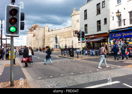 A pedestrian crossing on the High Street near Windsor Castle in Windsor, UK on a cloudy autumn day. Stock Photo