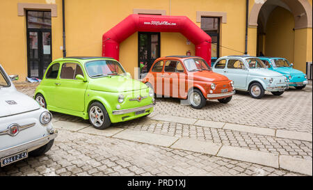 Fiat 500 Club meeting. The Fiat 500 (Italian: Cinquecento) is a city car which was produced by the Italian manufacturer Fiat Stock Photo