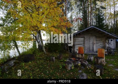 a fishing hut and grill place on the shore of a lake Stock Photo