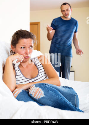 Two unhappy young sorting out their relationship Stock Photo