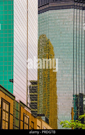 The Minneapolis skyline office building being reflected on adjacent buildings