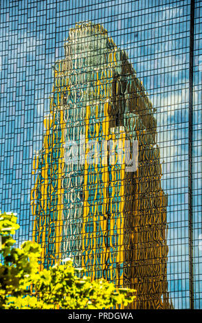 The Minneapolis skyline office building being reflected on adjacent buildings