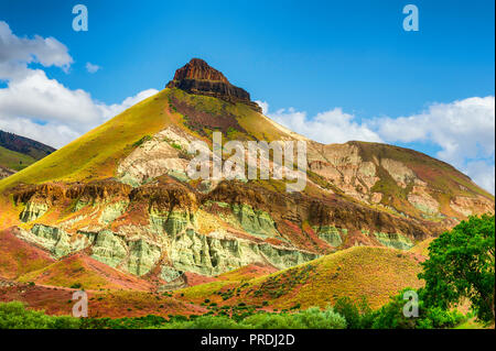 Sheep Rock a geological feature in the Sheep Rock Unit of John Day Fossil Beds National Park in Kimberly, Oregon Stock Photo