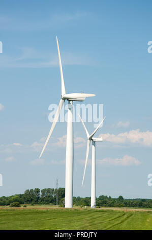Wind Power Station - Wind Turbine Against The Blue Sky Stock Photo - Alamy