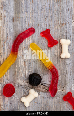 Colorful jelly candies on wooden background. Stock Photo