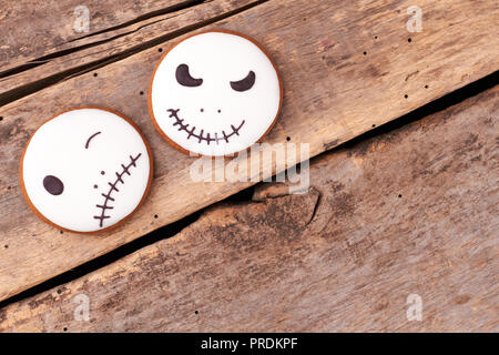 Jack Skellington cookies on wooden background. Stock Photo