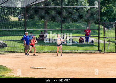 New York City, USA - June 7, 2017: Unidentified people plays amateur baseball in Central Park. Stock Photo