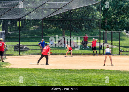 New York City, USA - June 7, 2017: Unidentified people plays amateur baseball in Central Park. Stock Photo