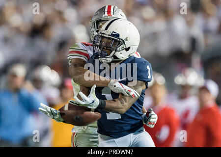 University Park, Pennsylvania, USA. 29th Sep, 2018. Penn State Nittany Lions wide receiver KJ Hamler (1) is defended by Ohio State Buckeyes safety Isaiah Pryor (12) during the second half of the NCAA football game between the Ohio State Buckeyes and the Penn State Nittany Lions at Beaver Stadium. Credit: Scott Taetsch/ZUMA Wire/Alamy Live News Stock Photo