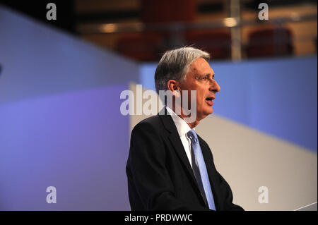Birmingham, England. 1st October, 2018.  Philip Hammond MP, Chancellor of the Exchequer, delivers his speech to conference on the morning session of the second day of the Conservative Party annual conference at the ICC.  Kevin Hayes/Alamy Live News Stock Photo