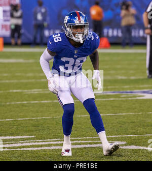 New York Giants cornerback Donte' Deayon (38) and Dallas Cowboys linebacker  Leighton Vander Esch (55) talk after the game on Sunday, Sept. 16, 2018, at  AT&T Stadium in Arlington, Texas. (Photo by