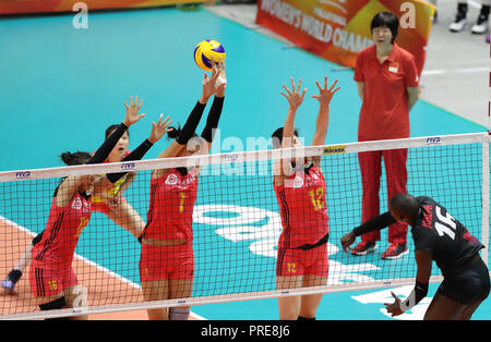 Sapporo, Japan. 2nd Oct, 2018. Ding Xia (1st L), Yuan Xinyue (3rd L) and Li Yingying (3rd R) of China block the ball during the Pool B match against Canada at the 2018 Volleyball Women's World Championship in Sapporo, Japan, Oct. 2, 2018. China won 3-0. Credit: Du Xiaoyi/Xinhua/Alamy Live News Stock Photo