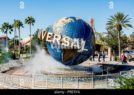 ORLANDO, FLORIDA, USA - DECEMBER, 2017: Iconic Universal Studios globe located at the entrance to the theme park in a beautiful sunlight day. Stock Photo