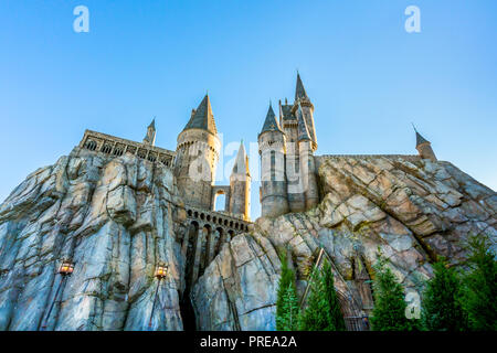ORLANDO, FLORIDA, USA - DECEMBER, 2017: Hogwarts Castle and Harry Potter Hogsmeade, The Wizarding World of Harry Potter, at Island of Adventure, Unive Stock Photo