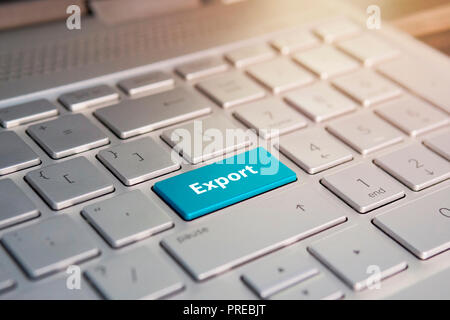 Business Concept: Close-up the Export button on the keyboard and have Orange color button isolate black keyboard. Stock Photo