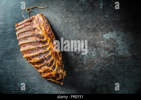 Top of view smoked pork ribs on mear board. Stock Photo
