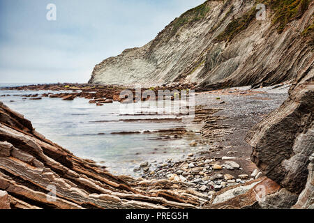 Flysch formations in the geological park at Itzurun Beach, Zumaia, Basque Country, Spain. Stock Photo