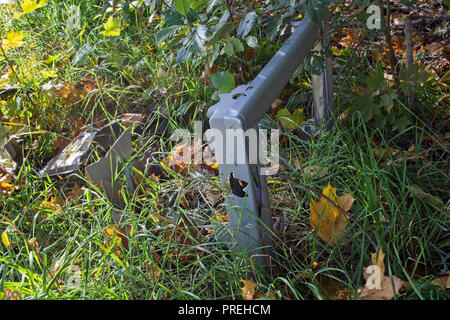 dumped tv on ground Stock Photo