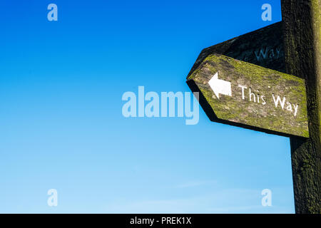Signpost pointing to ' the other way ' , 'this way' Stock Photo