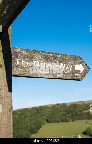 Signpost pointing to ' the other way ' Stock Photo