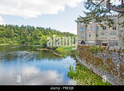 Ashford Castle is a medieval and Victorian castle that has been turned into a five-star luxury hotel near Cong in County Galway, Ireland. Stock Photo