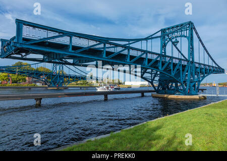 Kaiser Wilhelm Bridge at Wilhelmshaven, Germany, opened for passing sail boats Stock Photo